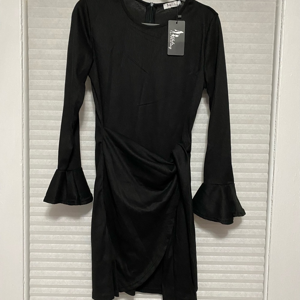 Flattering black light sweater dress
